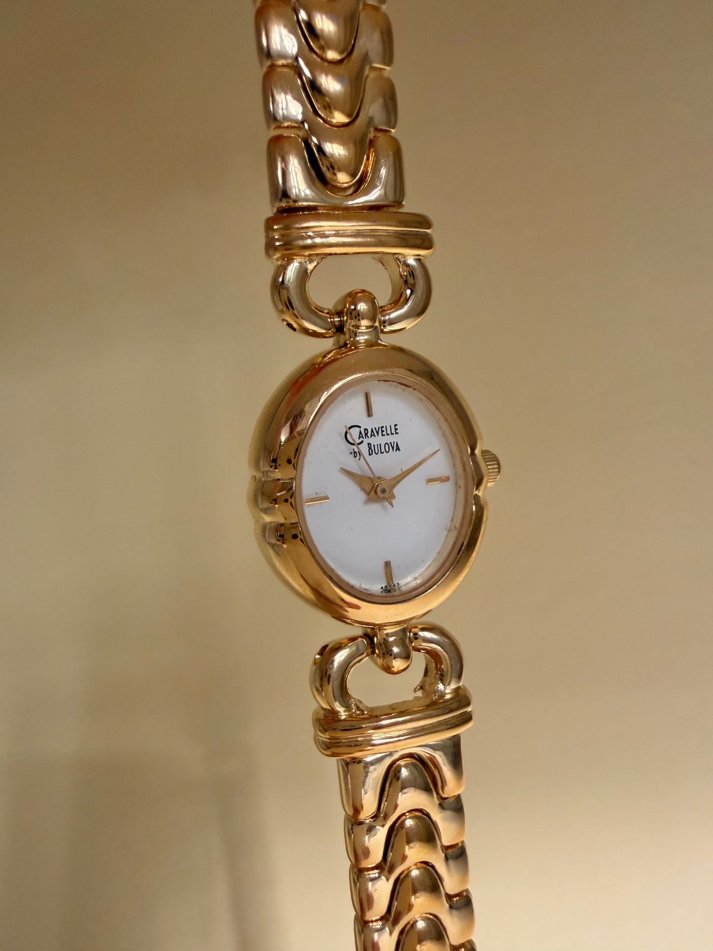 CARAVELLE BY BULOVA — Oval Gold Tone Chain Bracelet