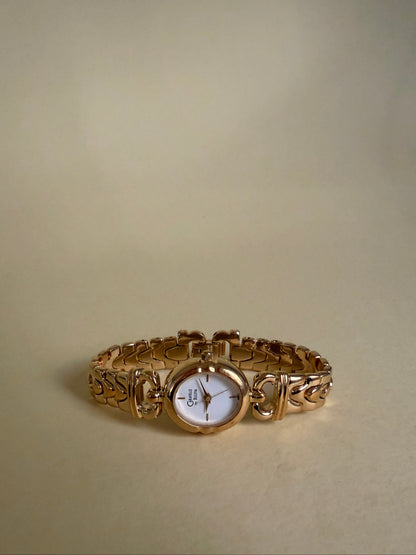 CARAVELLE BY BULOVA — Oval Gold Tone Chain Bracelet