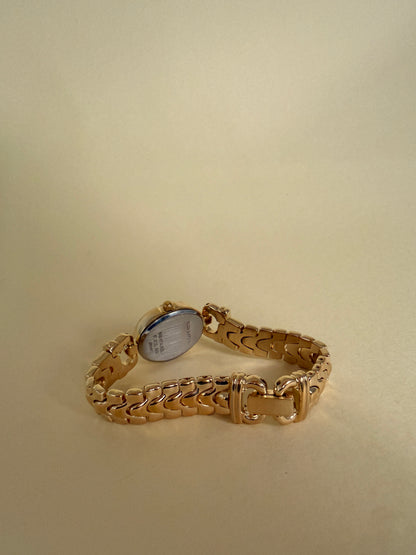 CARAVELLE BY BULOVA — Oval Gold Tone Chain Bracelet